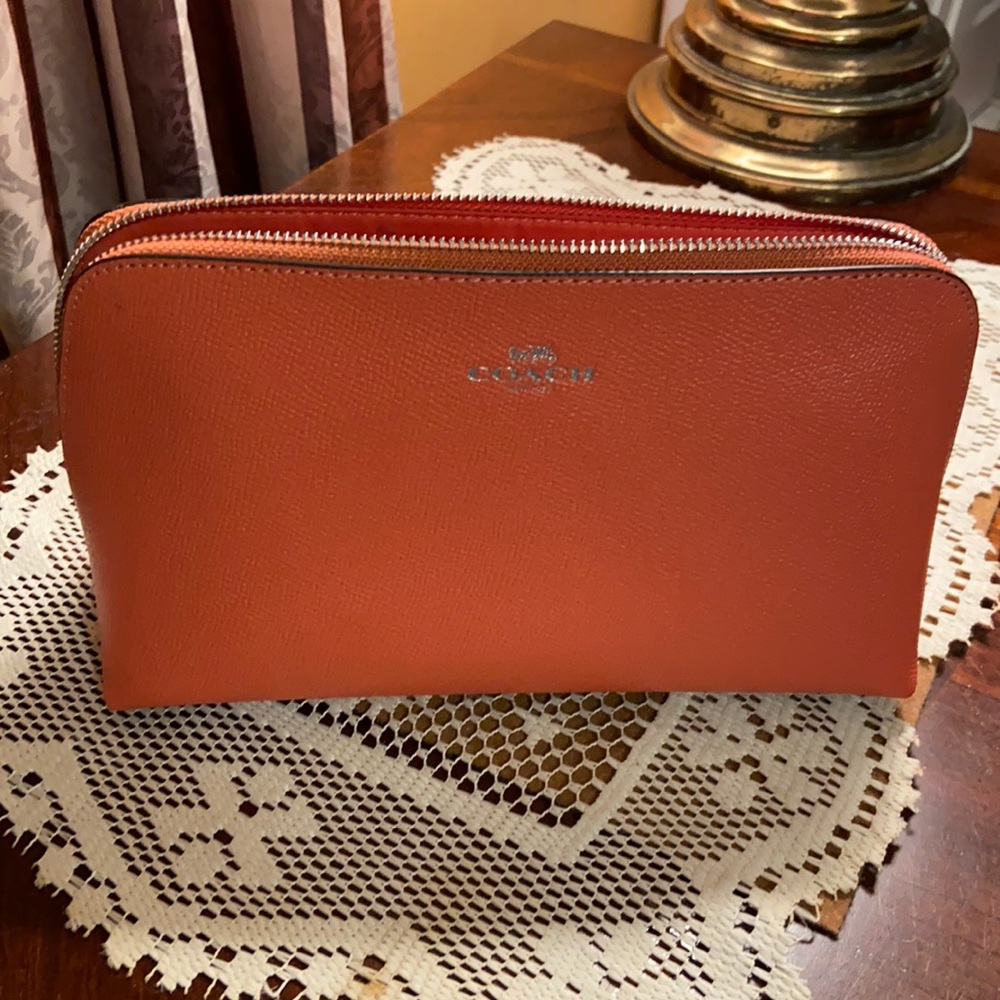 Coach NWOT coral zipper make up case